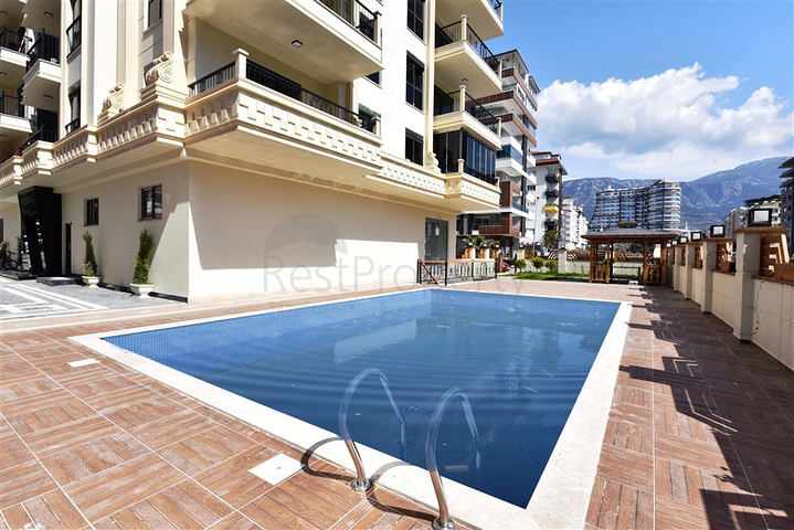 Трехкомнатная квартира в районе Махмутлар в 300 метрах от моря