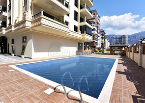 Трехкомнатная квартира в районе Махмутлар в 300 метрах от моря