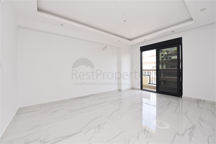 Новая трехкомнатная квартира в центре Махмутлара