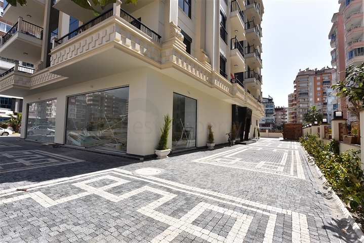 Новая трехкомнатная квартира в центре Махмутлара