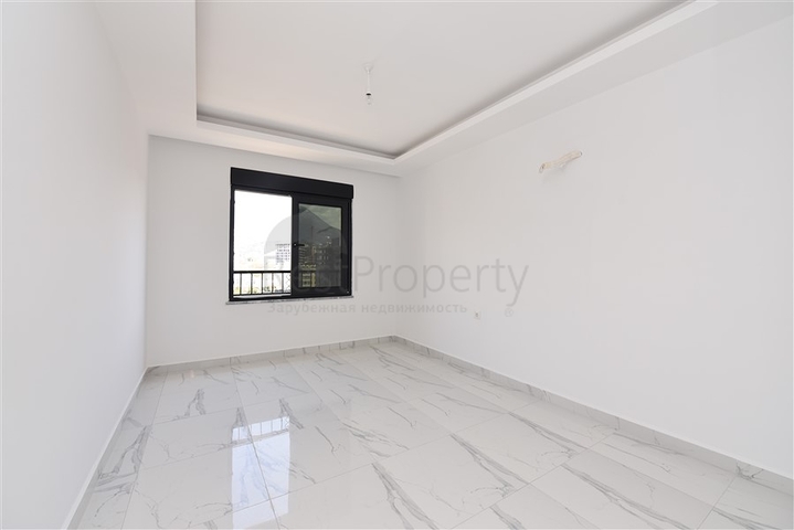 Новая трехкомнатная квартира в центре Махмутлара