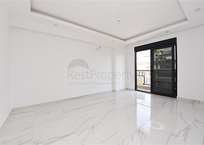 Новая трехкомнатная квартира в центре Махмутлара