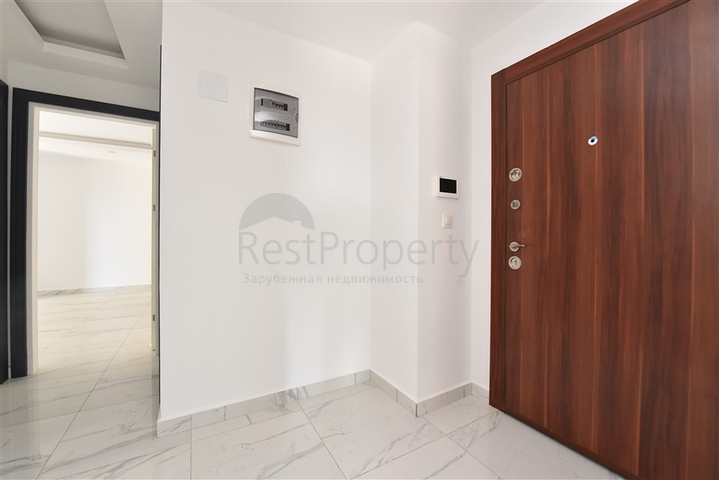 Трехкомнатные апартаменты в жилом комплексе в районе Махмутлар