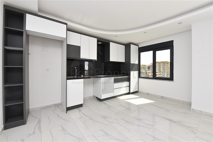 Трехкомнатные апартаменты в жилом комплексе в районе Махмутлар