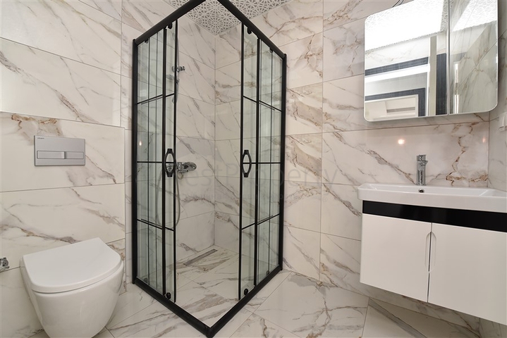 Трехкомнатные апартаменты в жилом комплексе в районе Махмутлар