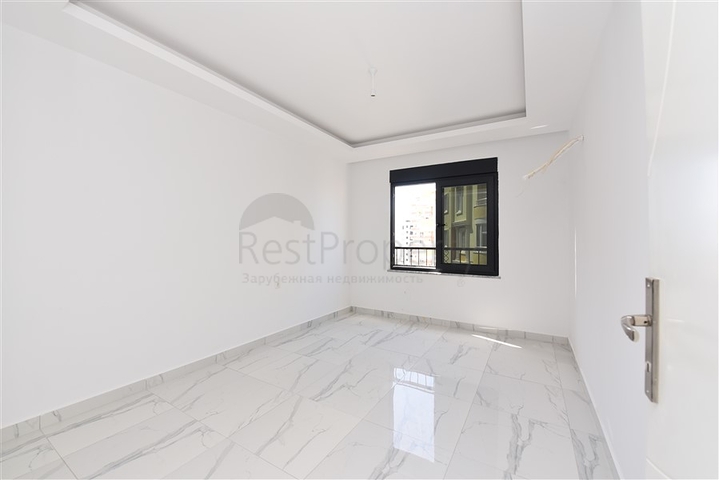 Трехкомнатные апартаменты в жилом комплексе в районе Махмутлар