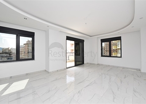 Трехкомнатные апартаменты в жилом комплексе в районе Махмутлар