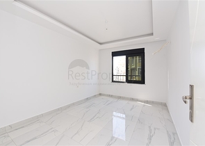 Трехкомнатные апартаменты в жилом комплексе в районе Махмутлар