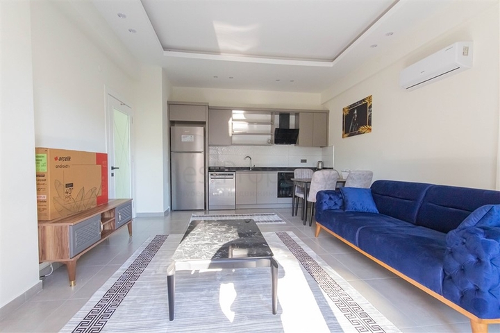 Меблированная двухкомнатная квартира в Махмутларе