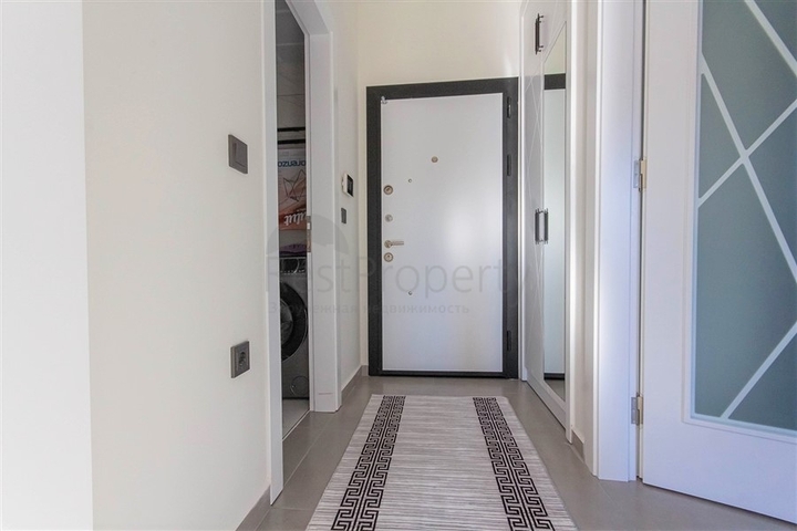 Меблированная двухкомнатная квартира в Махмутларе