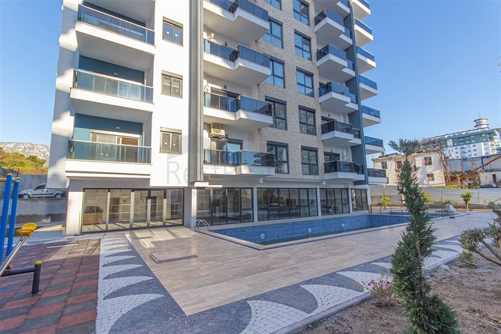 Меблированная двухкомнатная квартира в Махмутларе