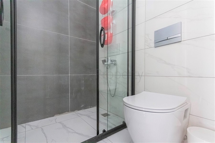 Меблированная двухкомнатная квартира в Махмутларе