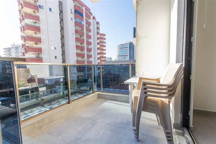 Меблированная двухкомнатная квартира в Махмутларе