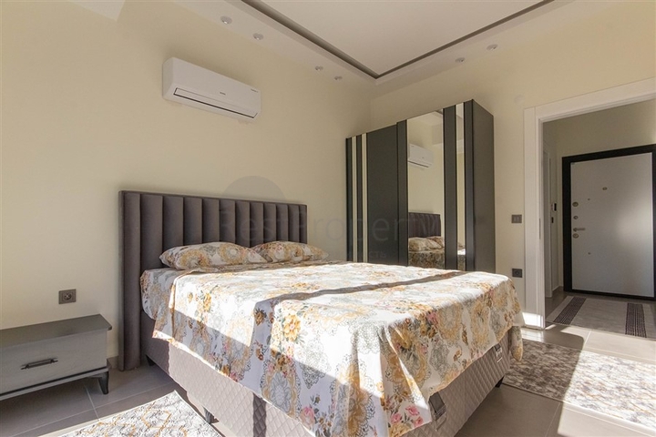 Меблированная двухкомнатная квартира в Махмутларе