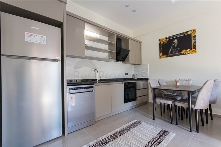 Меблированная двухкомнатная квартира в Махмутларе