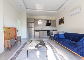 Меблированная двухкомнатная квартира в Махмутларе