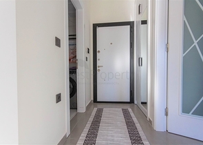 Меблированная двухкомнатная квартира в Махмутларе