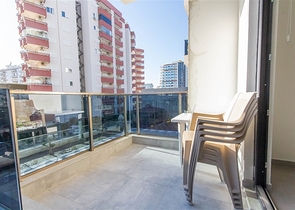 Меблированная двухкомнатная квартира в Махмутларе