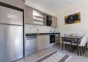 Меблированная двухкомнатная квартира в Махмутларе