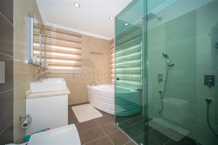 Вилла 3+1 с потрясающими видами на море и горы в районе Каргыджак