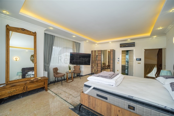 Вилла 3+1 с потрясающими видами на море и горы в районе Каргыджак