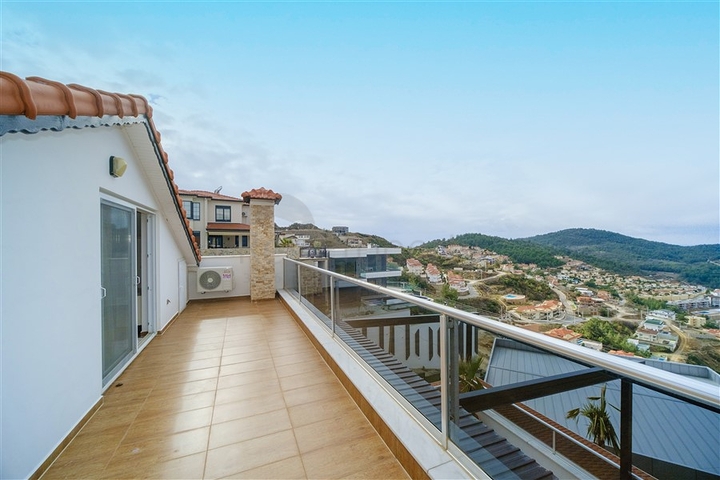 Вилла 3+1 с потрясающими видами на море и горы в районе Каргыджак