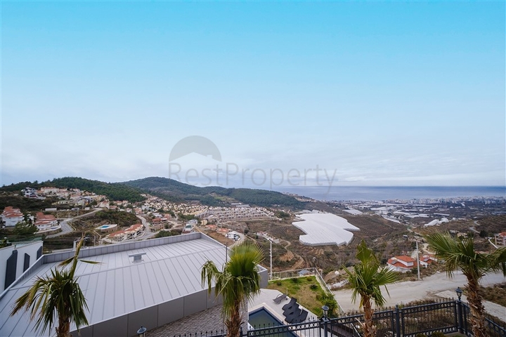 Вилла 3+1 с потрясающими видами на море и горы в районе Каргыджак