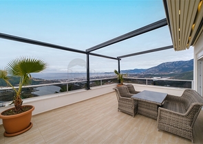 Вилла 3+1 с потрясающими видами на море и горы в районе Каргыджак