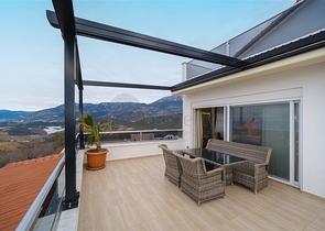 Вилла 3+1 с потрясающими видами на море и горы в районе Каргыджак