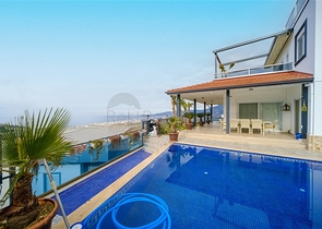 Вилла 3+1 с потрясающими видами на море и горы в районе Каргыджак