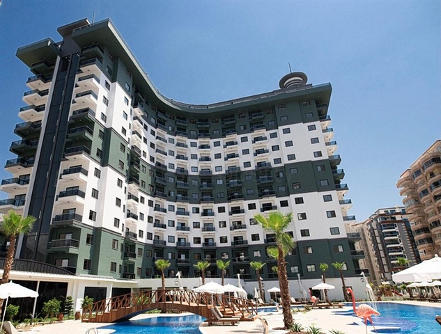 Квартира 1+1 в новом комплексе с отельной инфраструктурой в районе Махмутлар