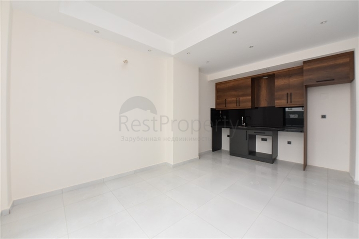 Квартира 1+1 в новом комплексе с отельной инфраструктурой в районе Махмутлар