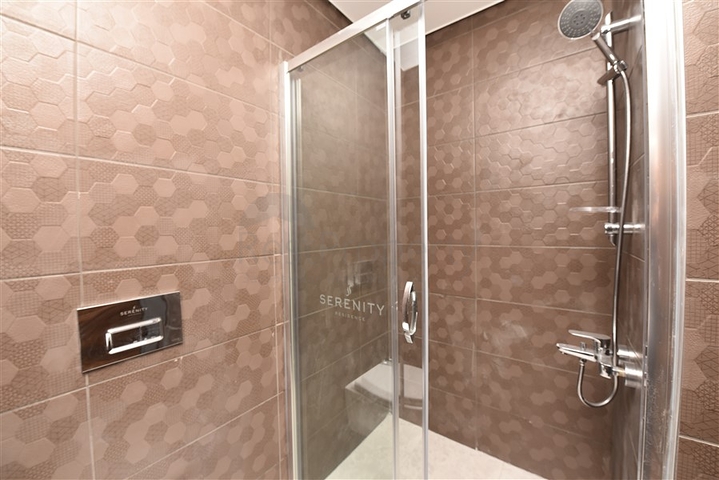 Квартира 1+1 в новом комплексе с отельной инфраструктурой в районе Махмутлар