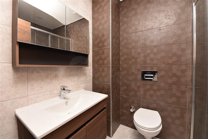 Квартира 1+1 в новом комплексе с отельной инфраструктурой в районе Махмутлар