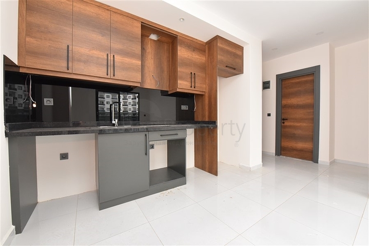 Квартира 1+1 в новом комплексе с отельной инфраструктурой в районе Махмутлар