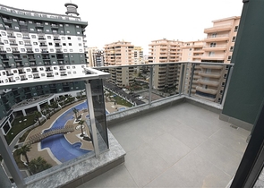 Квартира 1+1 в новом комплексе с отельной инфраструктурой в районе Махмутлар