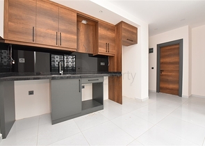 Квартира 1+1 в новом комплексе с отельной инфраструктурой в районе Махмутлар