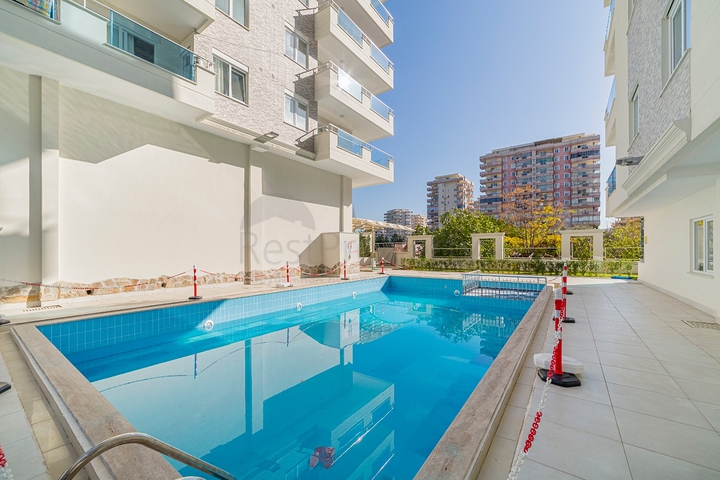 Квартира 2+1 в районе Махмутлар с отдельной кухней