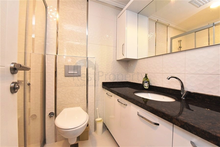 Квартира 2+1 в районе Махмутлар с отдельной кухней