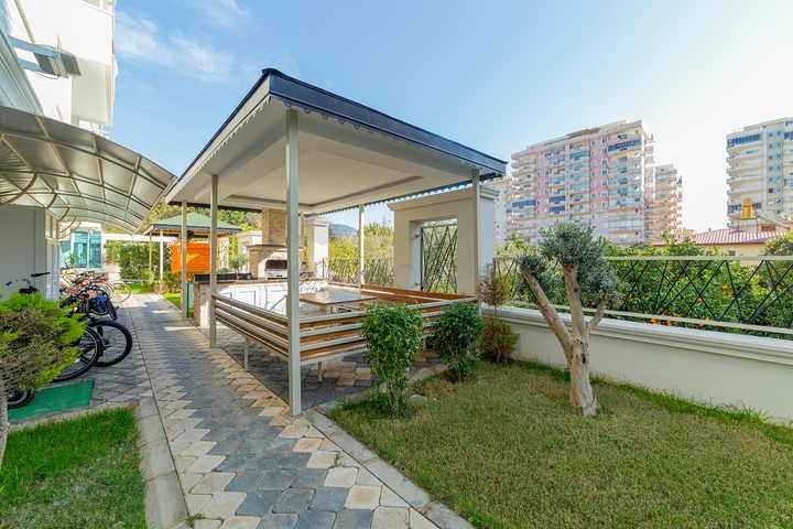 Квартира 2+1 в районе Махмутлар с отдельной кухней