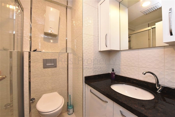 Квартира 2+1 в районе Махмутлар с отдельной кухней