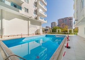 Квартира 2+1 в районе Махмутлар с отдельной кухней