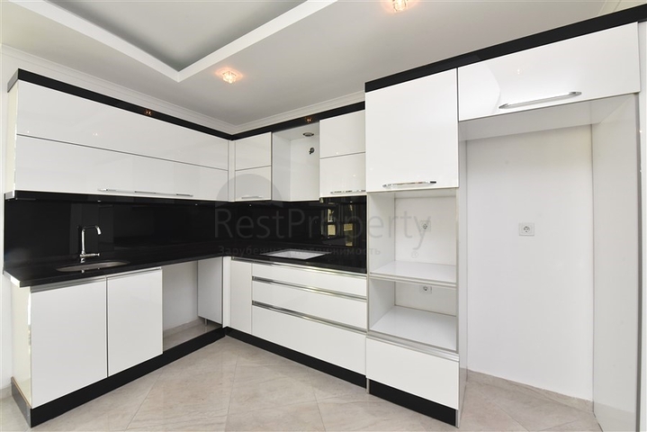 Просторная квартира планировкой 3+1 в живописном районе Оба