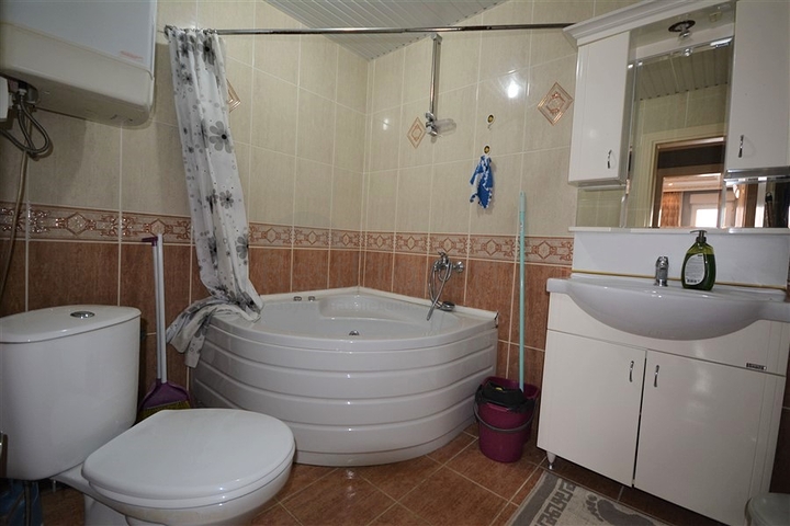 Трехкомнатная квартира в районе Махмутлар