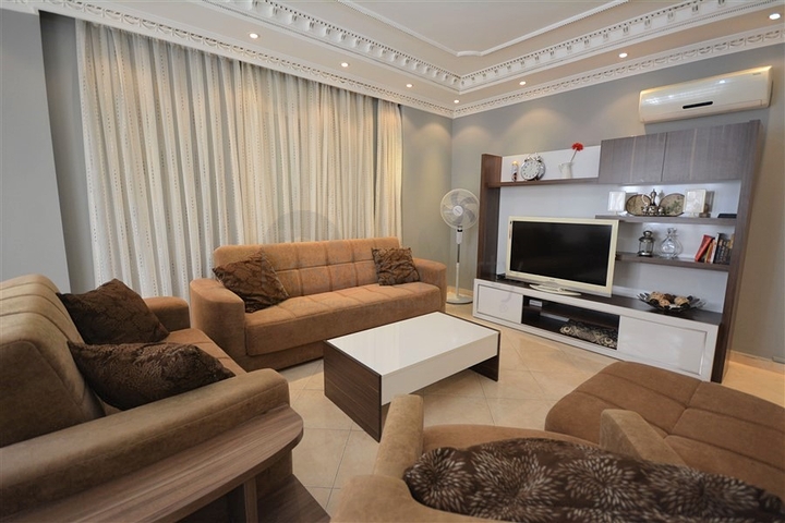 Трехкомнатная квартира в районе Махмутлар