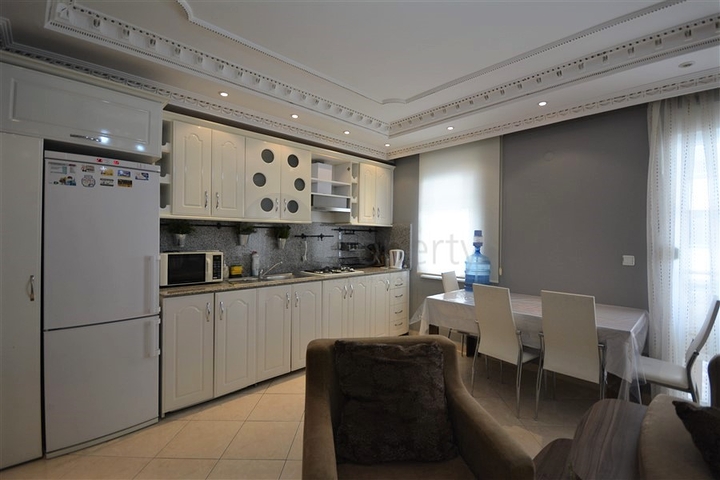 Трехкомнатная квартира в районе Махмутлар