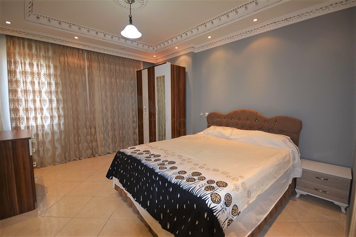 Трехкомнатная квартира в районе Махмутлар