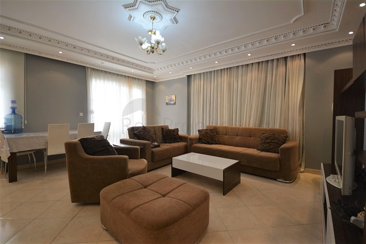 Трехкомнатная квартира в районе Махмутлар