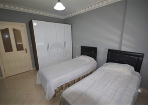 Трехкомнатная квартира в районе Махмутлар