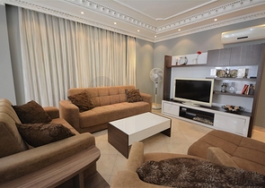 Трехкомнатная квартира в районе Махмутлар